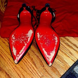 SHARKA FLANNEL CHRISTIAN LOUBOUTIN- worn once